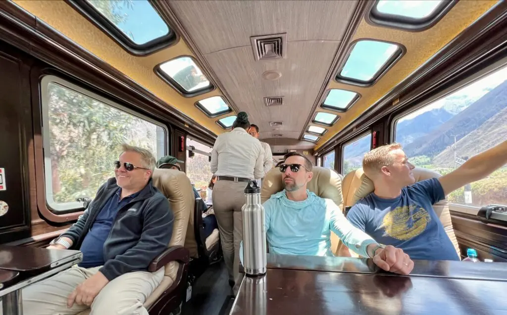 Guests ride the 360 Machu Picchu train on our gay trip to Peru