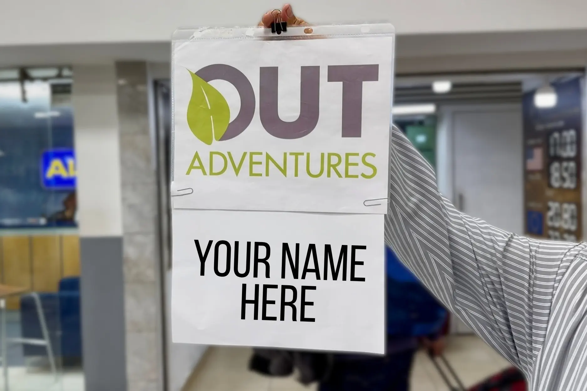 Your name on a sign at the airport