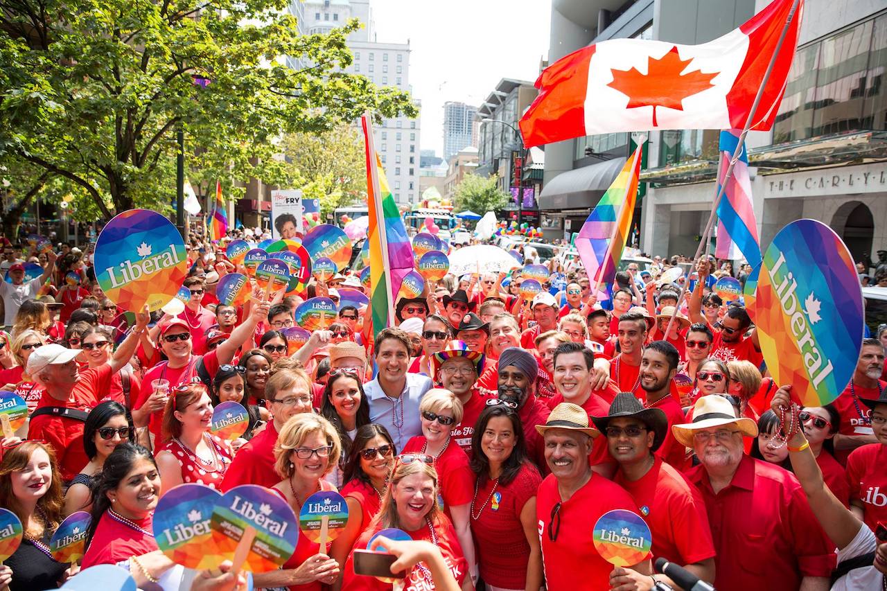 Canadian Prime Minister Justin Trudeau in the middle of a crowd during Vancouver Pride.
