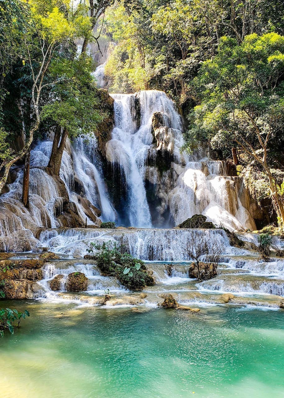 The cascading sapphire falls of Kuang Si, Laos.