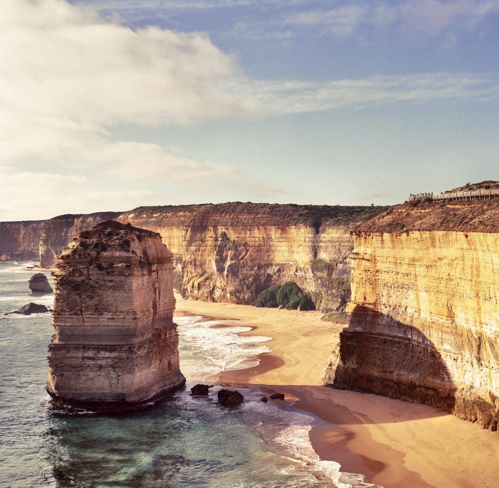 A scenic coast and one of the 12 Apostles along the Great Ocean Road.