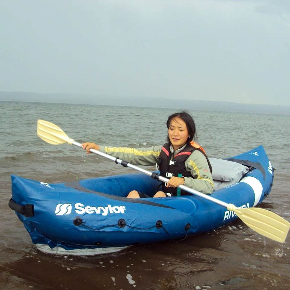 A woman kayaking in Mongolia.