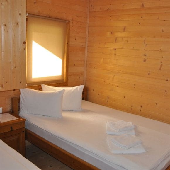 A standard room at Blue River Lodge in Tara, Montenegro.
