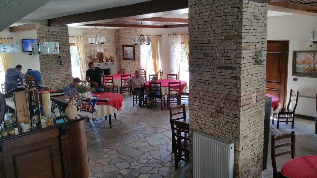 The common dining room at Hotel Margjeka in Valbona, Albania.