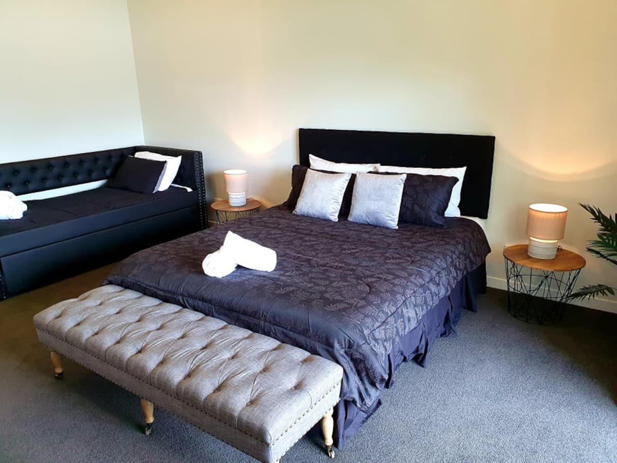 A double bed at Kohutapu Lodge, New Zealand.